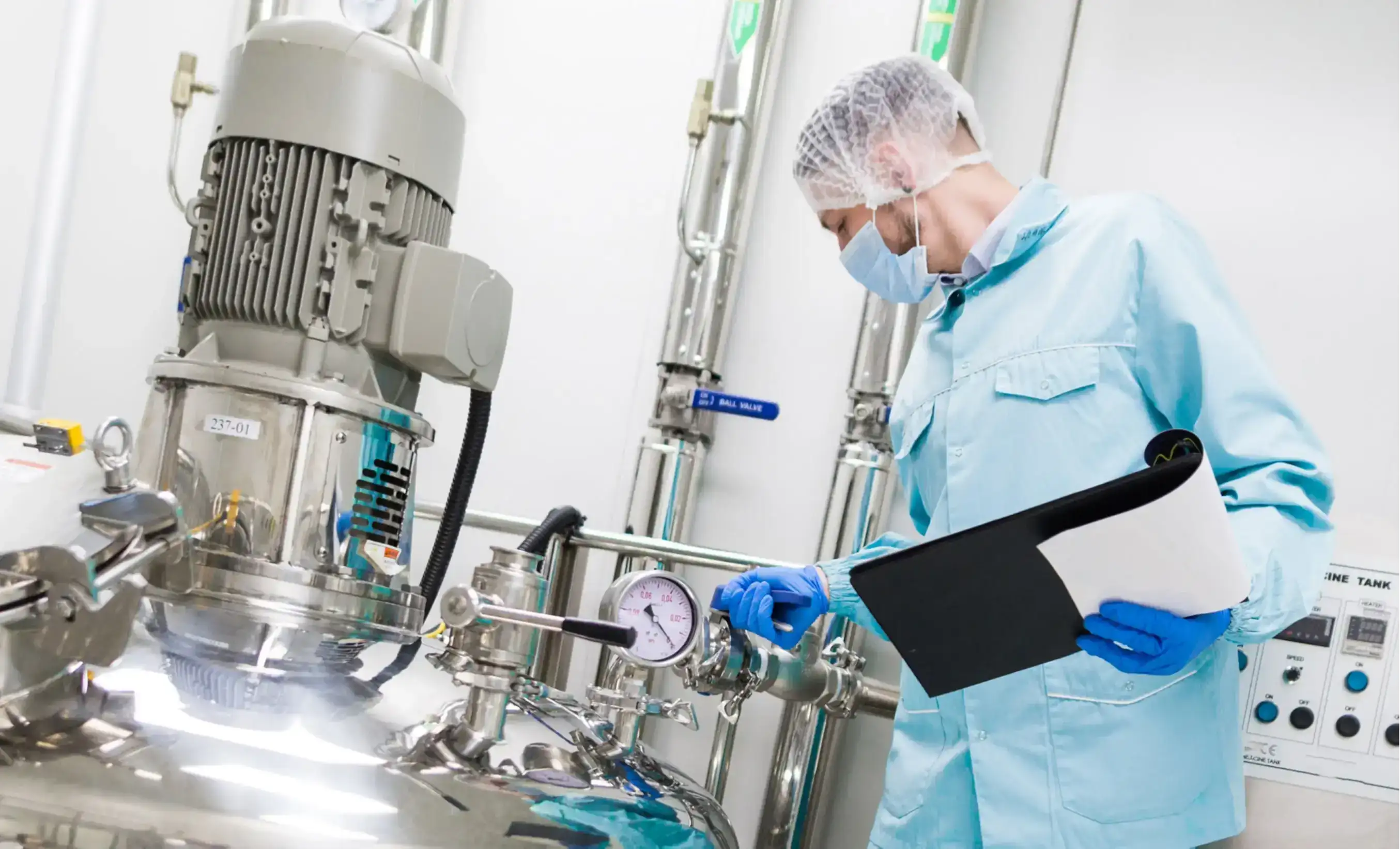 Oil and Gas test researcher in Middle East inspecting test equipment supplied by Eminent Technologies for documenting test results